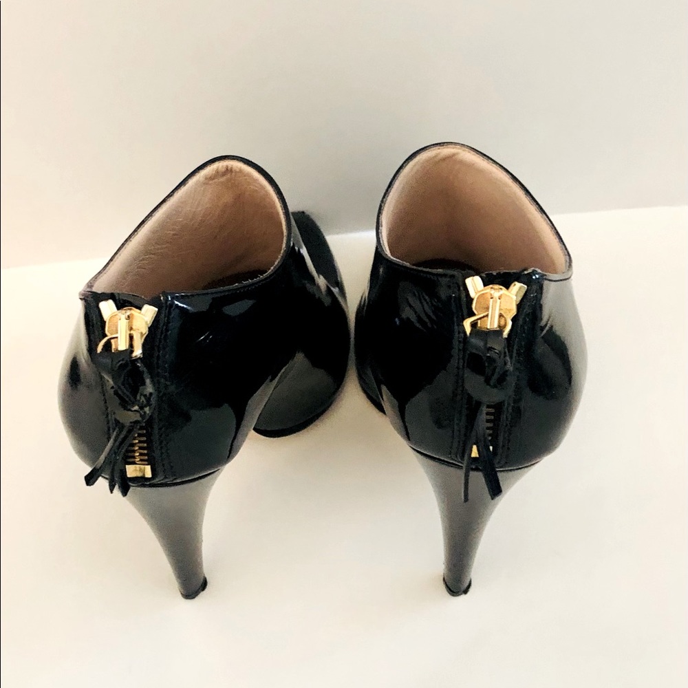 Sexy black patent leather Miu Miu stilettos